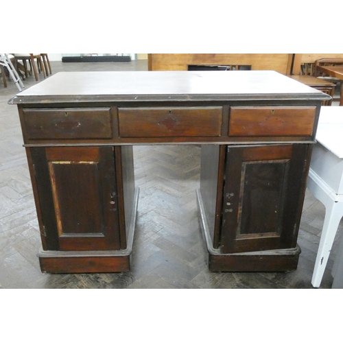 163 - Late Victorian mahogany kneehole pedestal desk fitted nine drawers in the partners style with cupboa... 