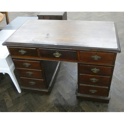 163 - Late Victorian mahogany kneehole pedestal desk fitted nine drawers in the partners style with cupboa... 