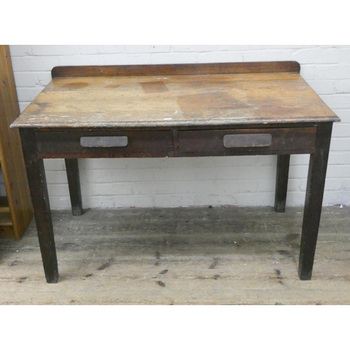 171 - An ex Ministry of Works oak writing table fitted two drawers on square legs, 4' x 2'4