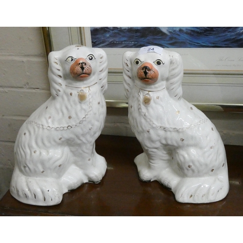 24 - A pair of Staffordshire Spaniel dogs