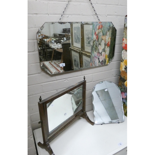 35 - An Art Deco frameless wall mirror, similar easel toilet mirror and another dressing table mirror