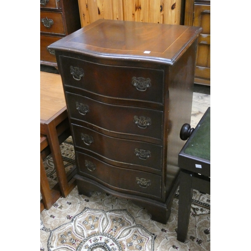 49 - A reproduction mahogany serpentine fronted chest of four long drawers