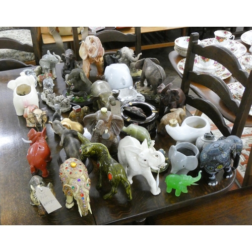 146 - A large collection of assorted elephant and other animal ornaments etc