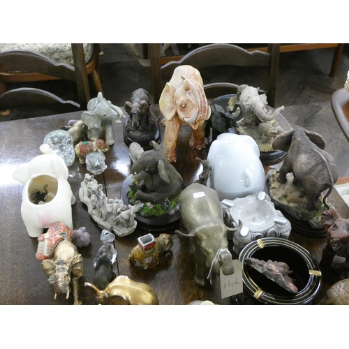 146 - A large collection of assorted elephant and other animal ornaments etc