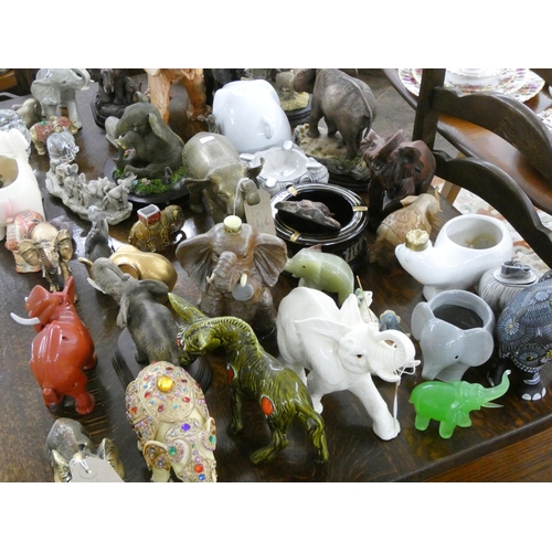 146 - A large collection of assorted elephant and other animal ornaments etc