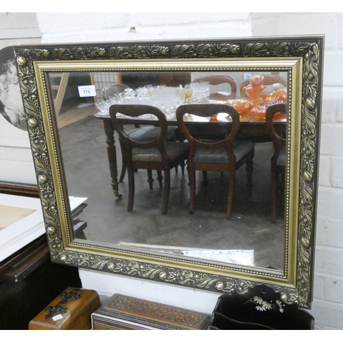 176 - A small Victorian style wall mirror in decorative gilt frame