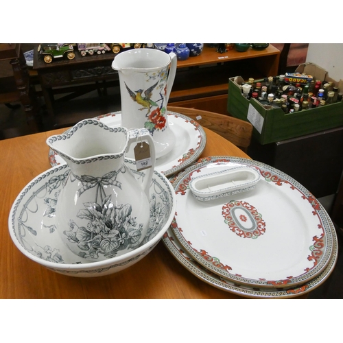 182 - Two large matching china meat plates, three piece china toilet set and another toilet jug