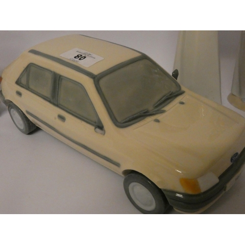 80 - Three Lladro figurines and an unusual Lladro Ford Fiesta car