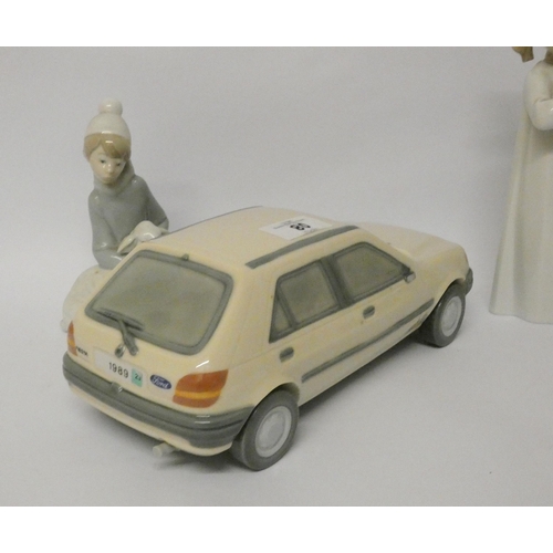 80 - Three Lladro figurines and an unusual Lladro Ford Fiesta car