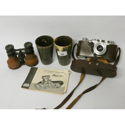 83 - A Leica vintage camera, two horn beakers and pair of old binoculars