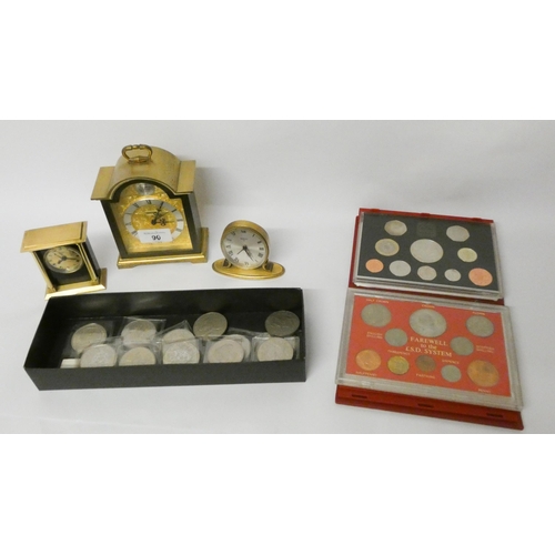 90 - Assorted commemorative crowns, coins sets and three various small clocks