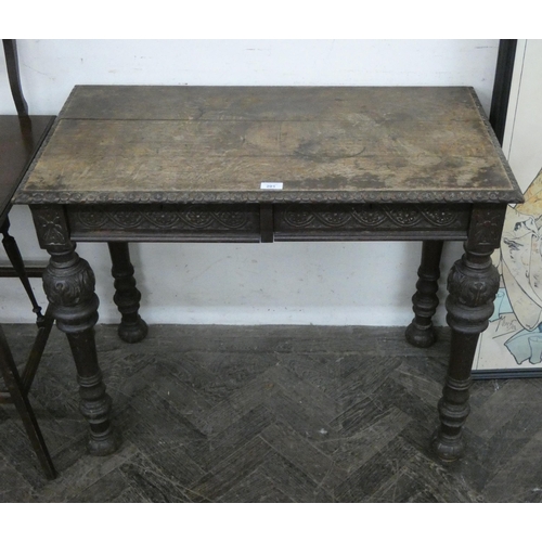 201 - A Victorian carved oak hall table fitted two drawers on carved bulbous legs, 3' wide