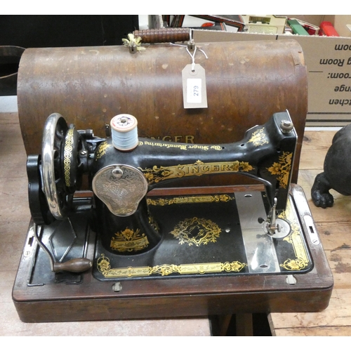 279 - An old Singer sewing machine in wooden case