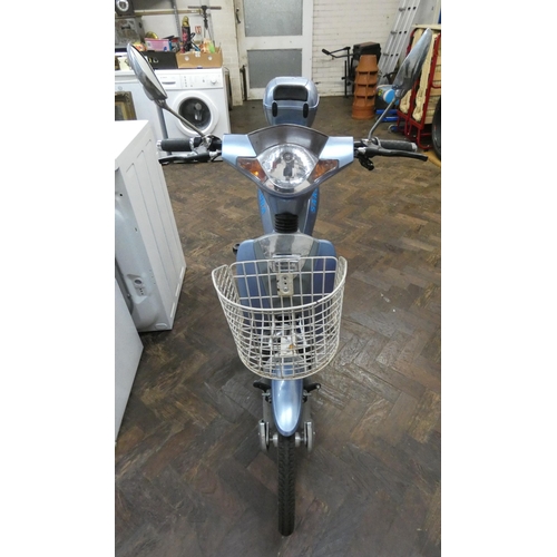 289 - A Sakura moped style electric bike with one key, charger etc and small rear top box