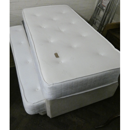 140 - A 3' divan bed with truckle guest bed