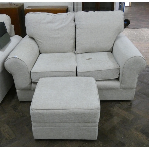 230 - A matching cream chenille small two seater sofa with matching footstool