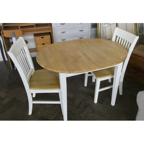 233 - A modern beech and cream painted kitchen table and a pair of matching chairs