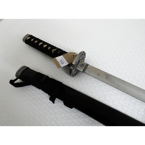 133 - A reproduction Japanese Samurai sword in scabbard