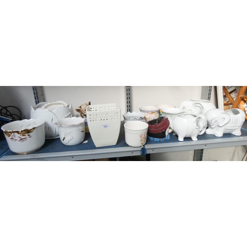 354 - A large quantity of ceramic plant pots and some elephant plant pots