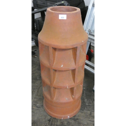 406 - A large clay chimney pot with vent holes, 30 1/2