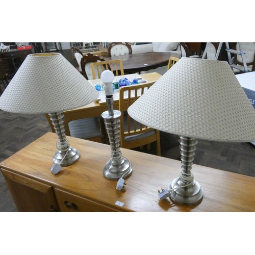 2 - Three ribbed effect table lamps, two with cream shades