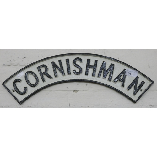 678 - A curved Cornish man wall hanging cast iron sign