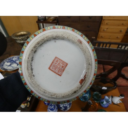 100 - Three Chinese blue and white china ginger jars, a wall plate and a Famille rose ginger jar without a... 