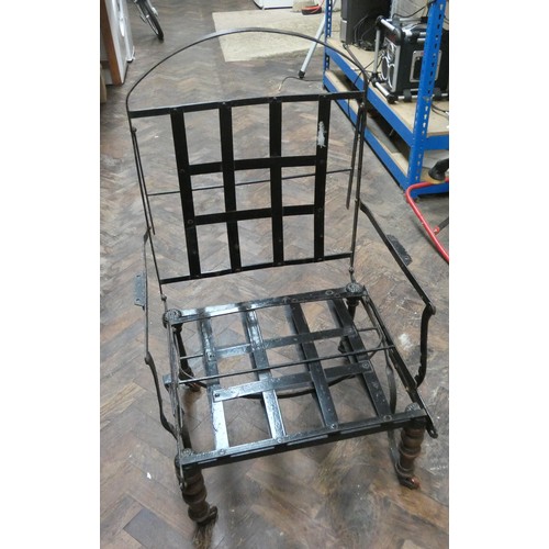 411 - A 1920's metal reclining garden chair