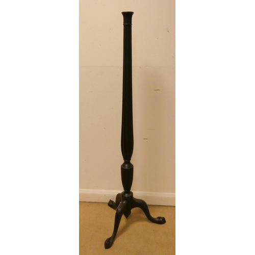 154 - A mahogany reeded column lamp standard, standing on claw and ball feet