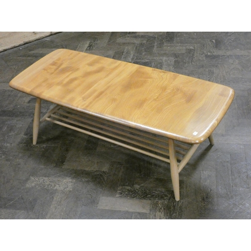 162 - An Ercol blonde elm coffee table