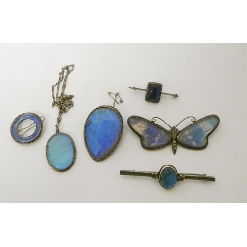 421 - A collection of five vintage sterling silver mounted butterfly wing brooches to include a large butt... 