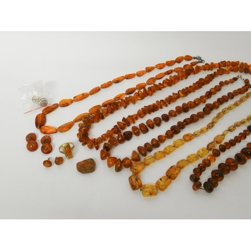 431 - A collection of five Baltic amber bead necklaces, silver mounted stud earrings, cufflinks etc