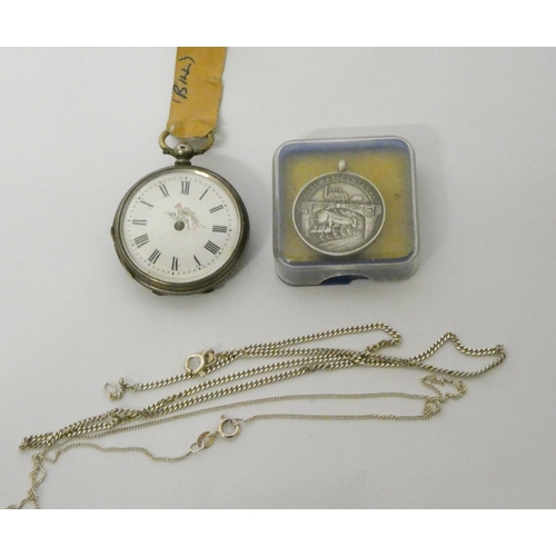 433 - Old silver fob watch, chain, and a silver Railway Centenary medallion