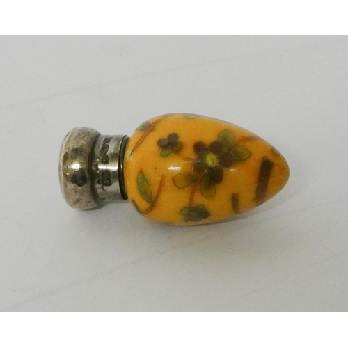 468 - Victorian egg-shaped scent bottle, painted  with forget me nots on an amber ground with silver cap, ... 