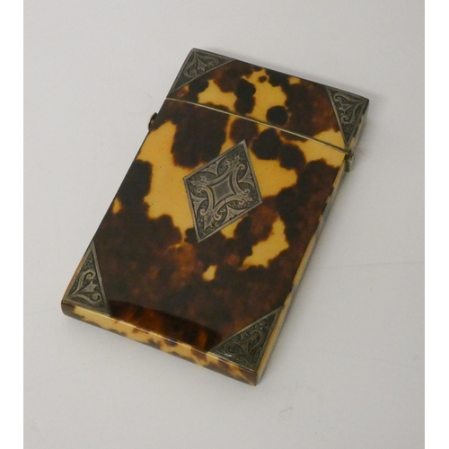 480 - A Victorian tortoiseshell and silver mounted card case 8.5 cms x 5cms