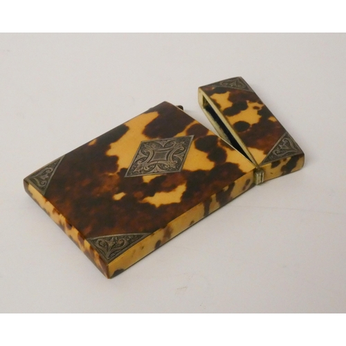 480 - A Victorian tortoiseshell and silver mounted card case 8.5 cms x 5cms