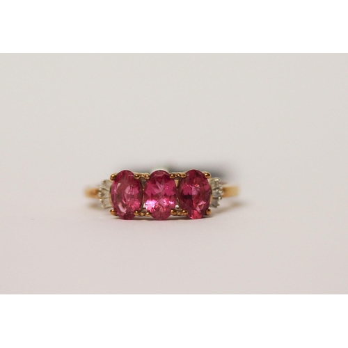 505 - Modern rubellite and diamond ring, as new with tags and box, ring size L