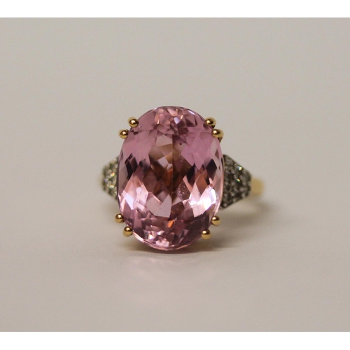 509 - A large modern Kunzite and diamond dress ring, on 18ct gold band. With certificate stating pink Kunz... 