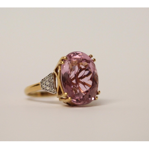 509 - A large modern Kunzite and diamond dress ring, on 18ct gold band. With certificate stating pink Kunz... 