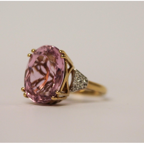 509 - A large modern Kunzite and diamond dress ring, on 18ct gold band. With certificate stating pink Kunz... 