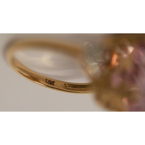 509 - A large modern Kunzite and diamond dress ring, on 18ct gold band. With certificate stating pink Kunz... 