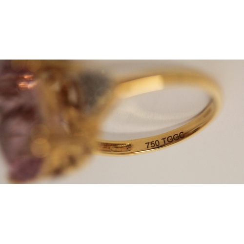 509 - A large modern Kunzite and diamond dress ring, on 18ct gold band. With certificate stating pink Kunz... 