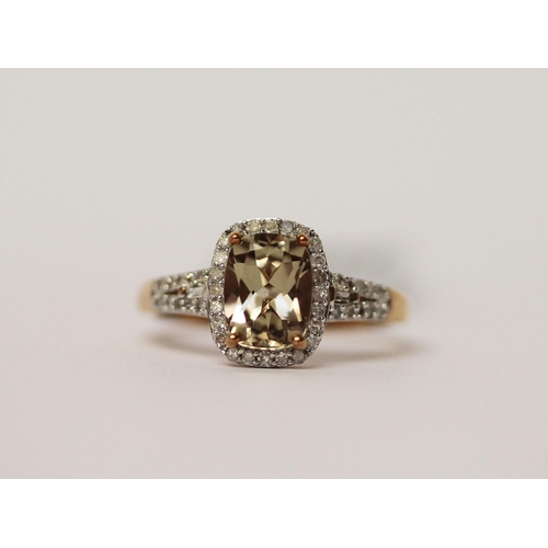 511 - A modern turkizite and diamond oval cluster ring, on 9ct gold band, as new with box, tag and certifi... 