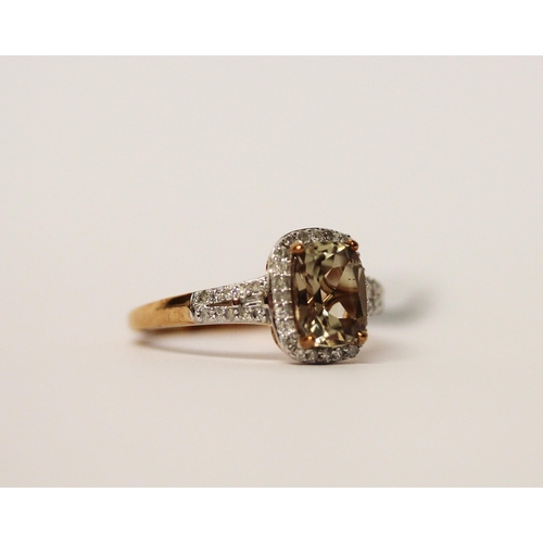 511 - A modern turkizite and diamond oval cluster ring, on 9ct gold band, as new with box, tag and certifi... 