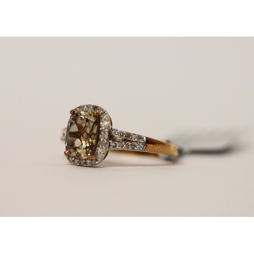 511 - A modern turkizite and diamond oval cluster ring, on 9ct gold band, as new with box, tag and certifi... 