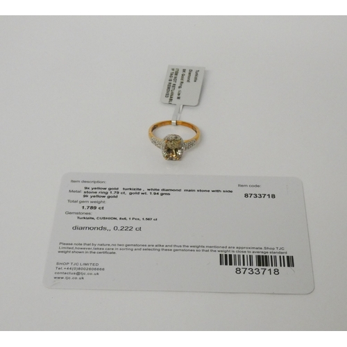 511 - A modern turkizite and diamond oval cluster ring, on 9ct gold band, as new with box, tag and certifi... 