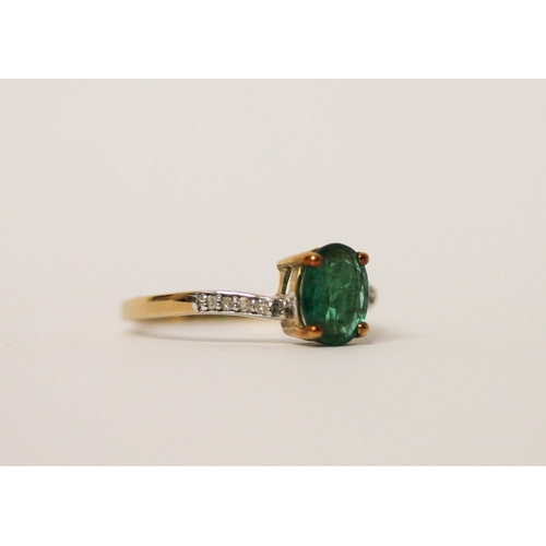 512 - A modern emerald and diamond dress ring, on 9ct gold, with certificate. Ring size N