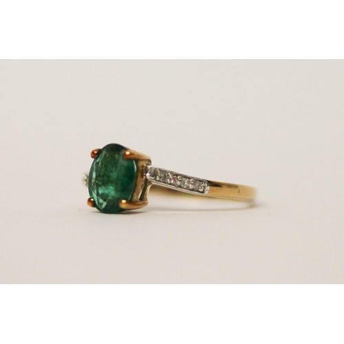 512 - A modern emerald and diamond dress ring, on 9ct gold, with certificate. Ring size N