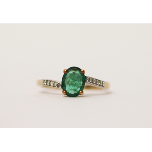 512 - A modern emerald and diamond dress ring, on 9ct gold, with certificate. Ring size N