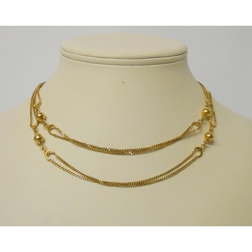 401 - Long 9ct yellow gold double strand gold chain with crescent moon and ball shaped links. 78 cms long,... 